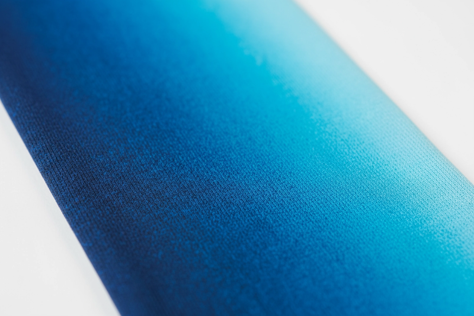 Custom yoga leggings pattern detail close-up - sublimation printing quality on athletic fabric