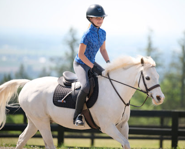 Kerrits kids riding gear with UPF sun protection