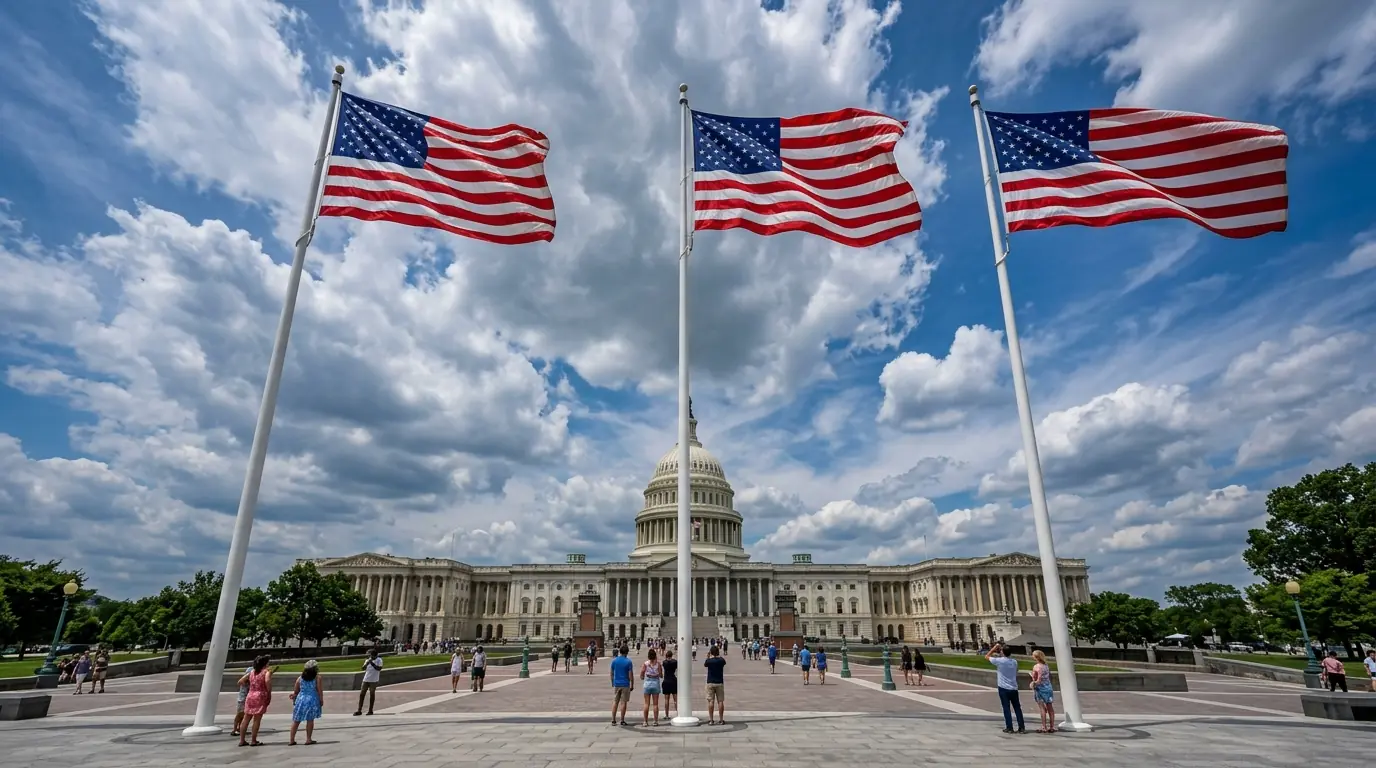 Massive flags on very tall flagpoles in front of a government building fully unfurled in the wind showing large commercial and government scale